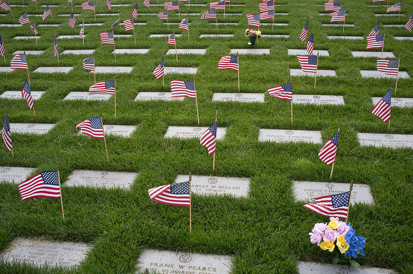 Veterans cemetery tombstones and flags